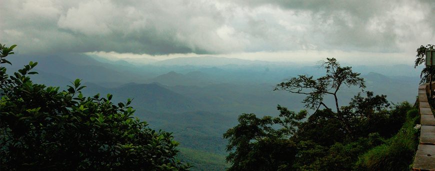 Clouds over mountains in Kerala, India, during monsoon season.