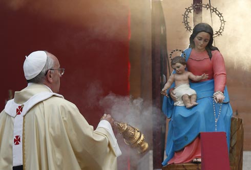Pope Francis, incense, Roman Catholic mass, statue of Mary and Christ Child.