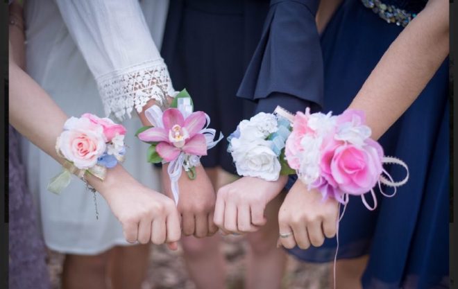 Wrist corsages at high school formal prom dance