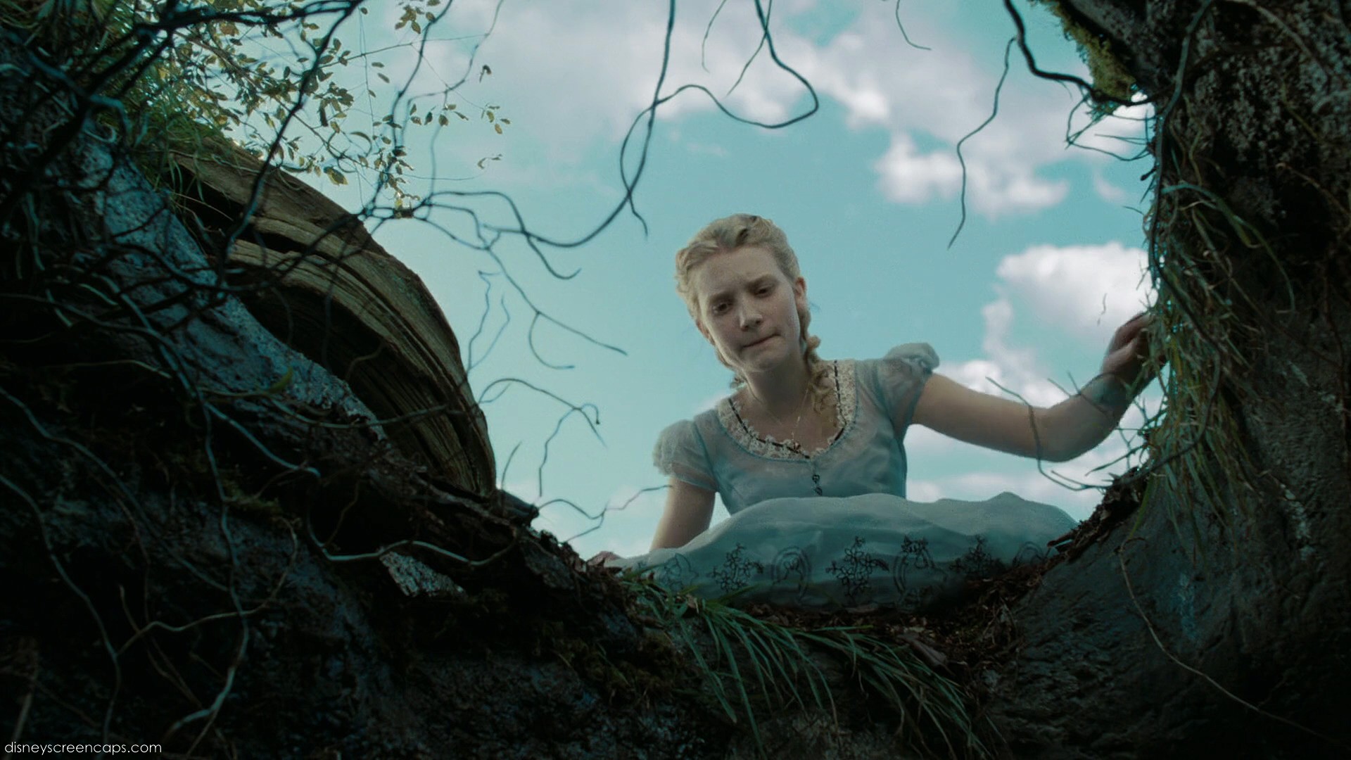 Mia Waskikowska in Tim Burton's Alice in Wonderland, by Disney, falling into rabbit-hole