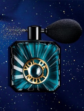 Blue green atomizer bottle of Guerlain's Vol de Nuit shimmer powder