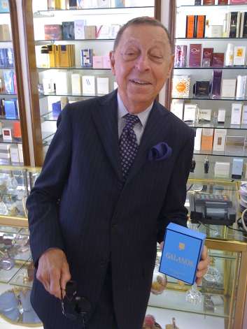 Fashion designer James Galanos in Jacqueline perfume boutique, San Francisco