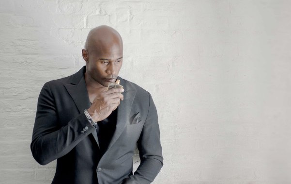 Chris Collins in grey suit with pocket square