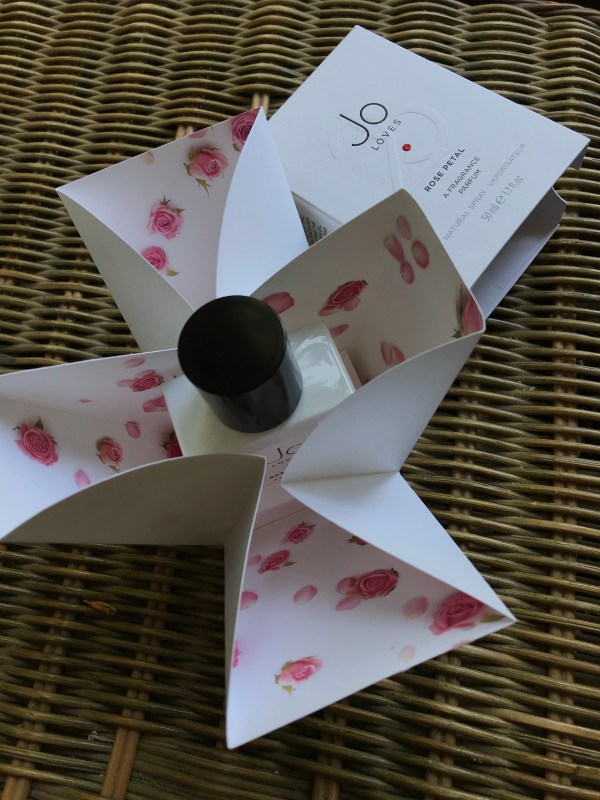 Bottle and box of Jo Loves fragrance Rose Petal 25
