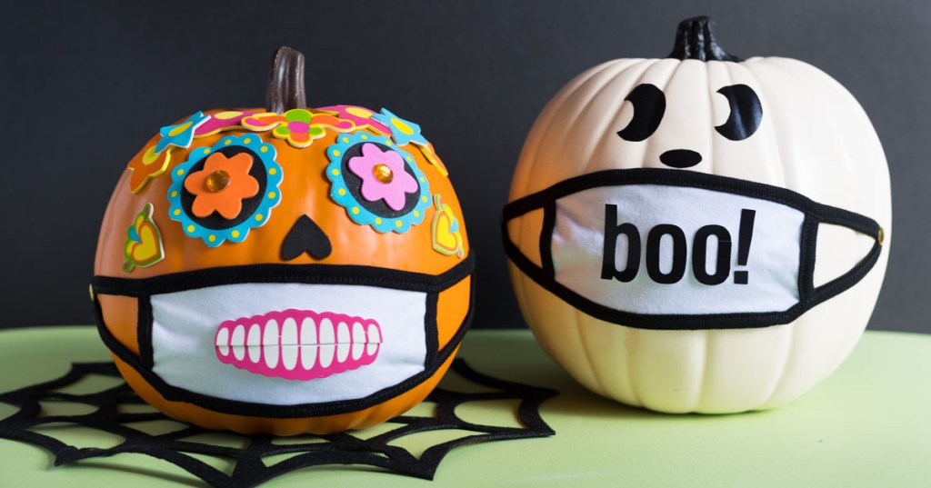 Colorful jack o' lanterns with face masks