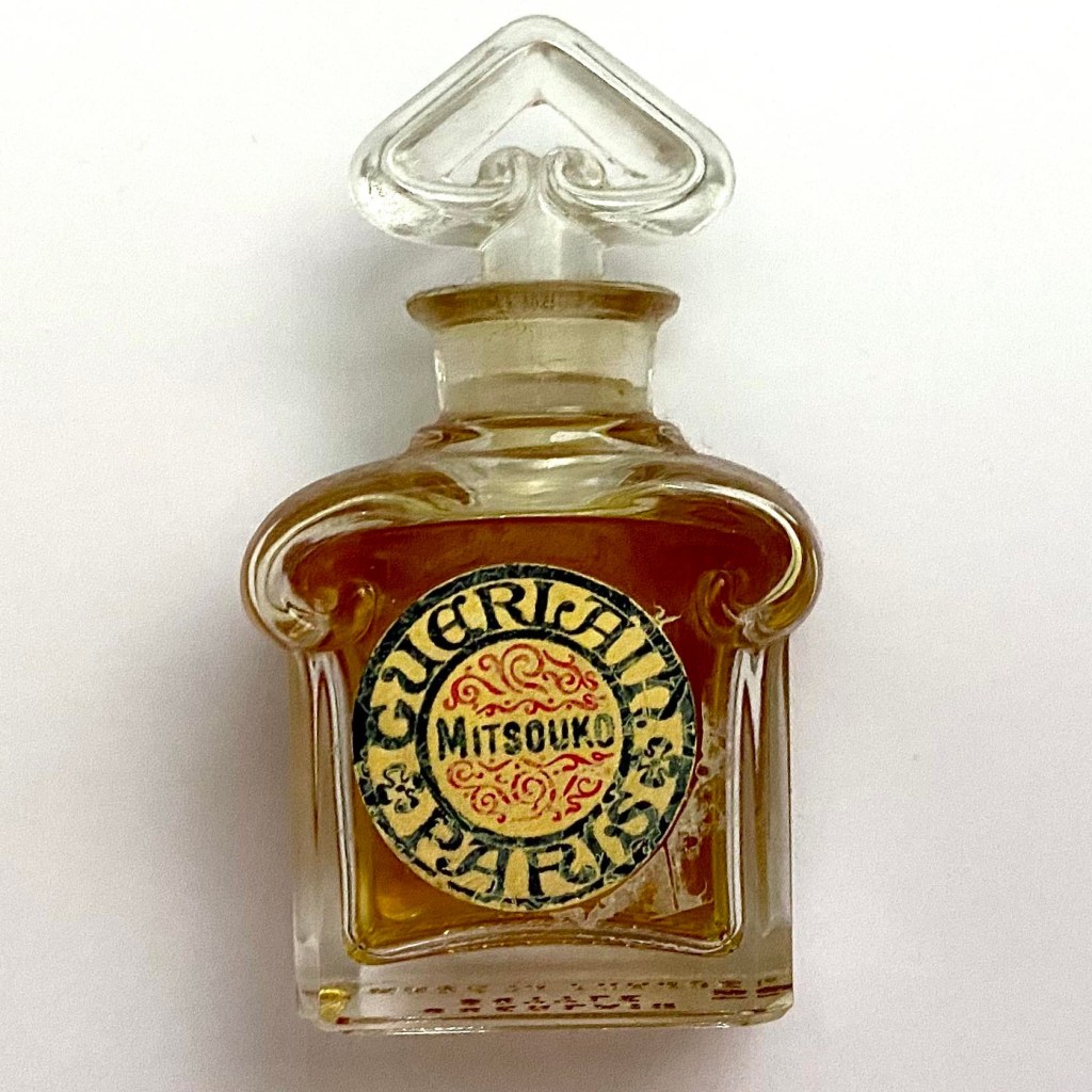 Bottle of Mitsouko perfume extrait